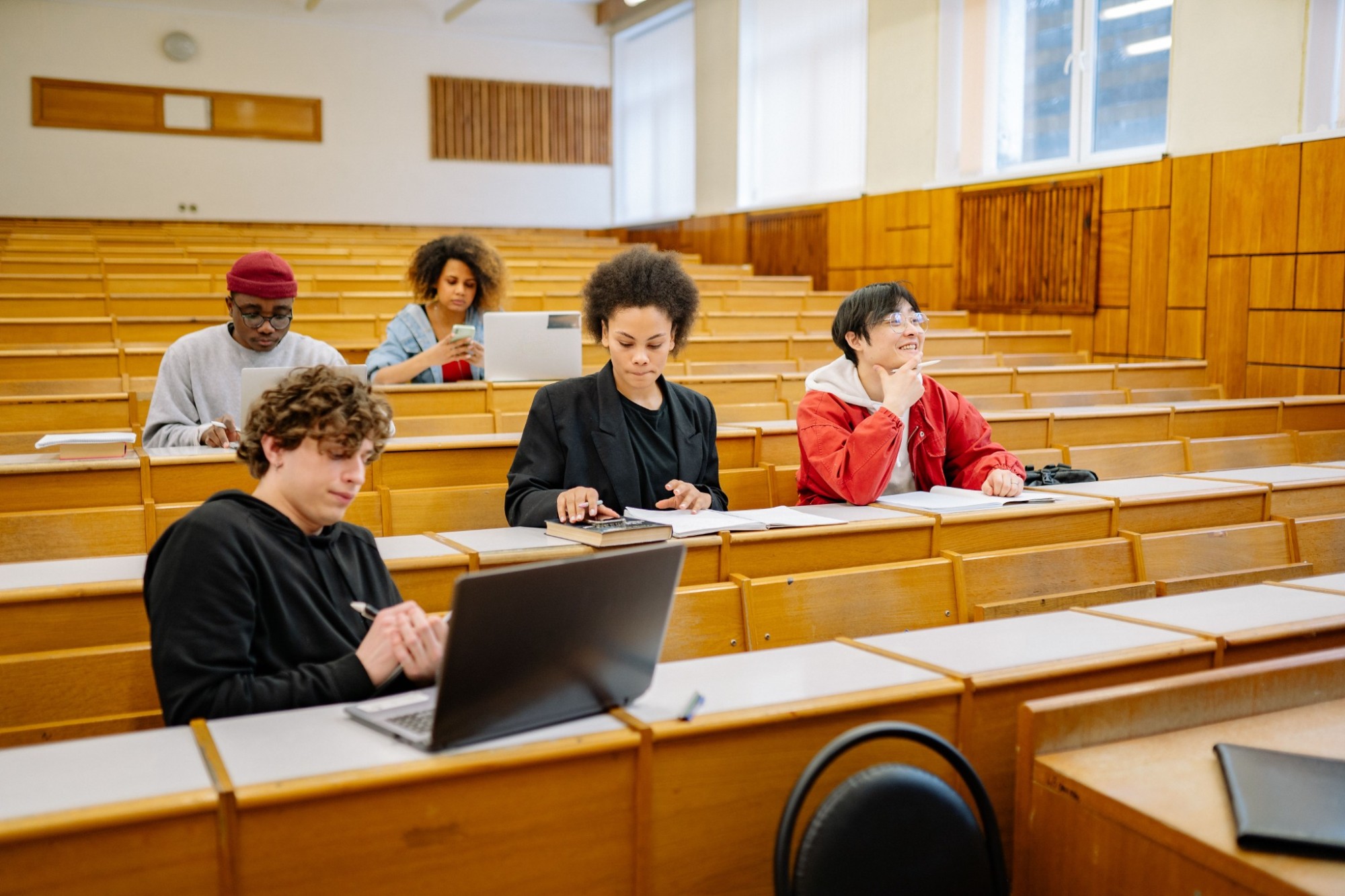 Diverse students attend a university lecture